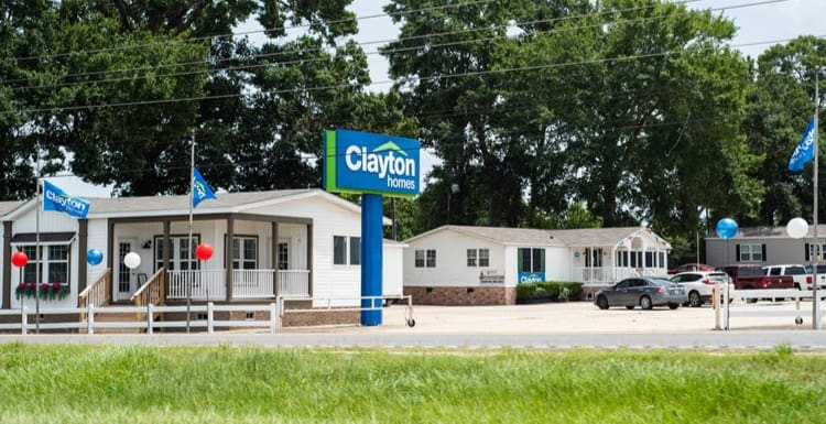 Clayton homes of Lafayette, mobile home dealer, exterior signage, and sales lot in South Louisiana.