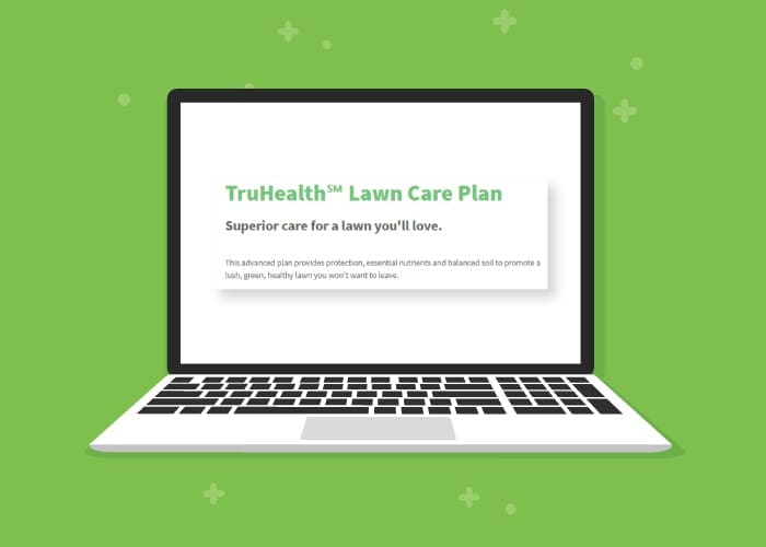 Truhealth lawn care plan displayed on a graphic laptop
