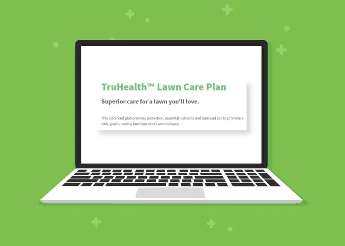 Truhealth lawn care plan displayed on a graphic laptop