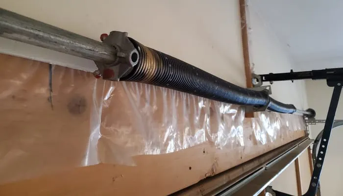 Garage door spring installed on torsion tube