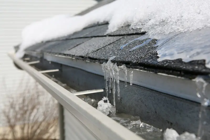 Ice dams on roof and gutters