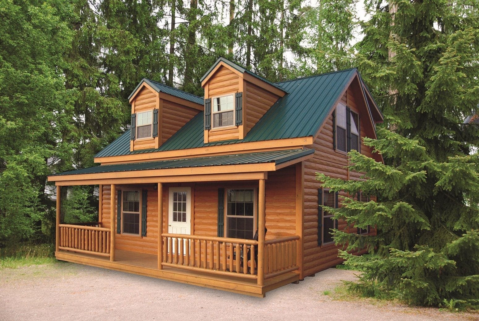 Rivewrood log cabin kit by Woodtex featuring a kit in a clearing in a row of pine trees