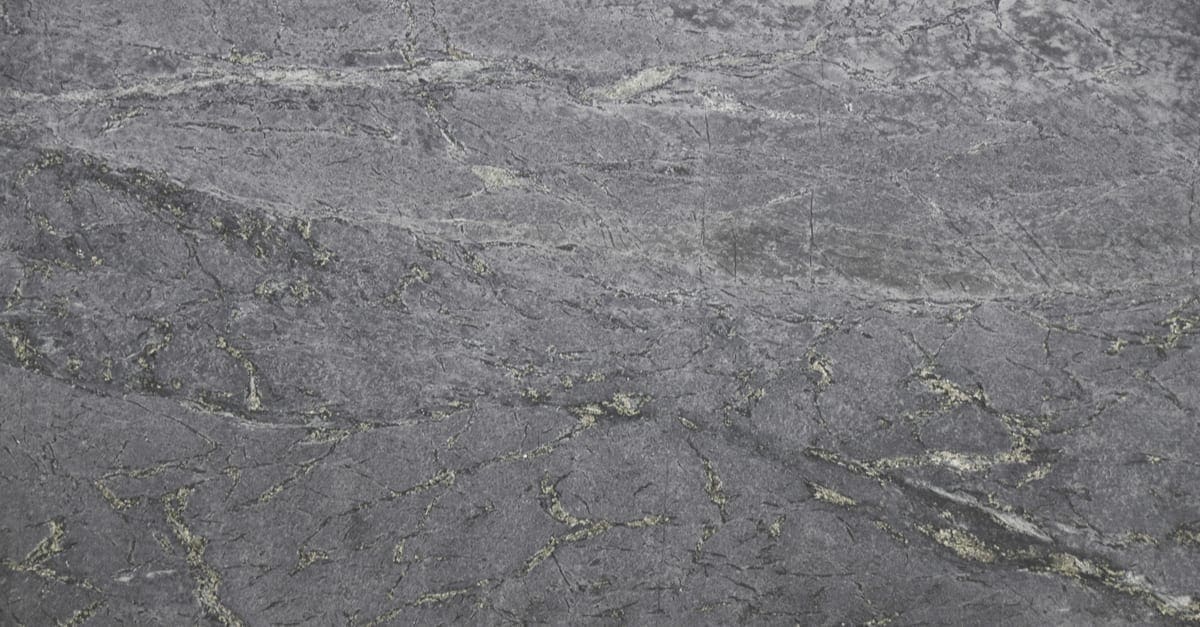 Closeup black soapstone with natural pattern texture background