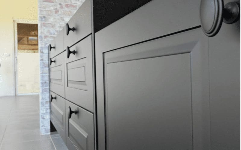 For a piece on base cabinet dimensions, a bunch of dark cabinets with hardware