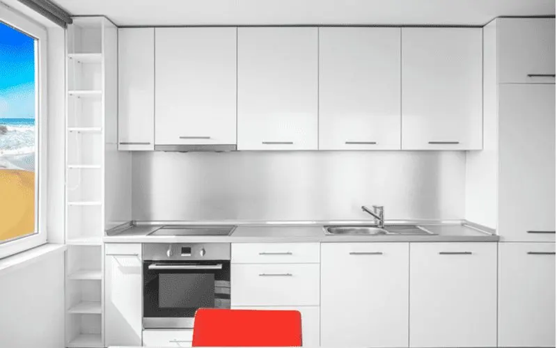 The kitchen cabinet dimensions featuring white upper cabinets