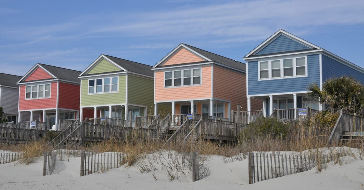 Pretty oceanfront beach rental homes at the seashore as the featured image for a piece on the airbnb refund policy