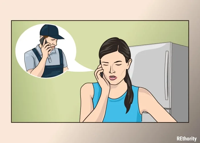 Image of a woman on a phone calling a fridge repairman