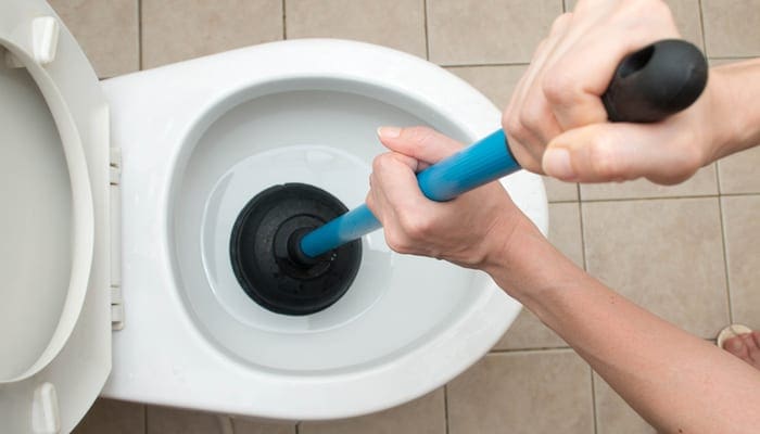 Toilet repair by hand Plumbing