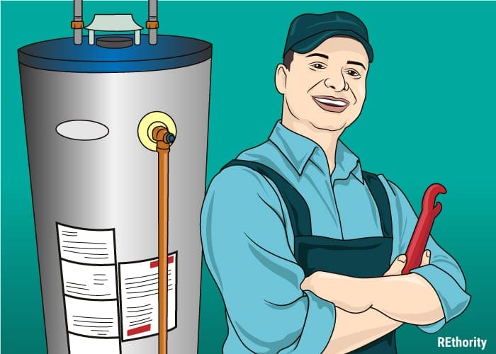 A plumber standing in front of a water heater with a wrench in his hand