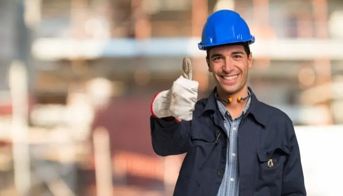Smiling worker in a construction site