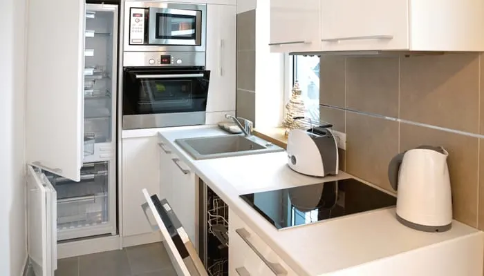 Everything is Open in a tiny home Small Modern White Kitchen