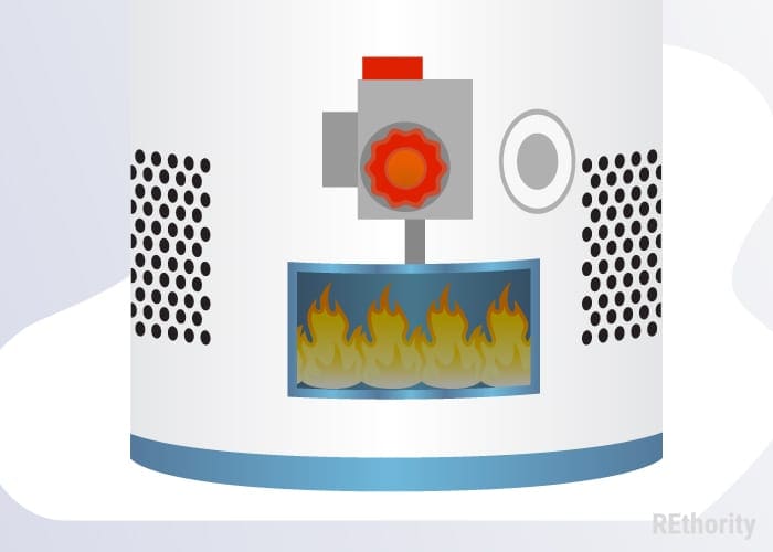 A water heater pilot light below the thermostat