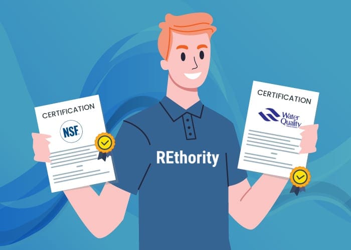 Whole house water filter certifications from a guy in a rethority shirt holding two pieces of paper