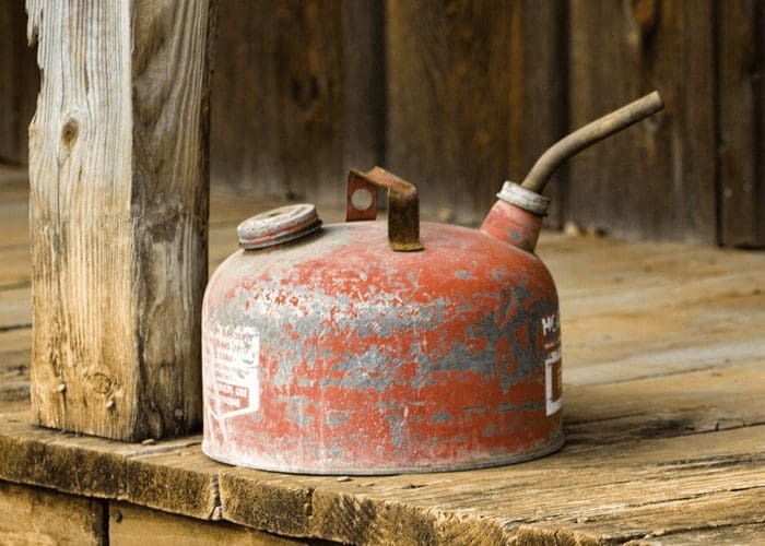 Image of an old red gas can for a piece on how to get rid of old gas