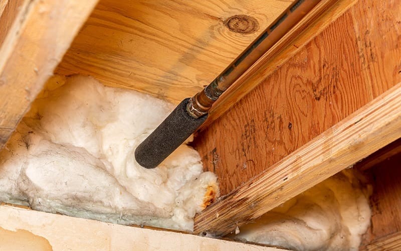Crawl space insulation protects pipes and helps with reducing house heating costs