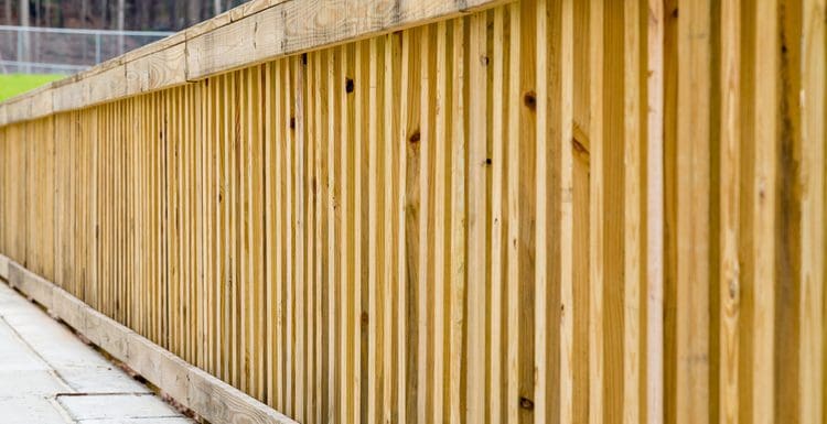 To answer Can You Stain Pressure Treated Wood, a number of boards make up a fence on the side of a bridge