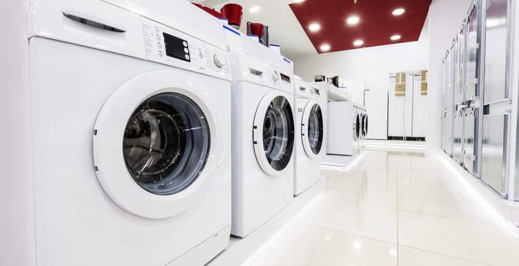 For a piece on dishwasher brands to avoid, a number of these appliances sit on a showroom with white walls and tan tile