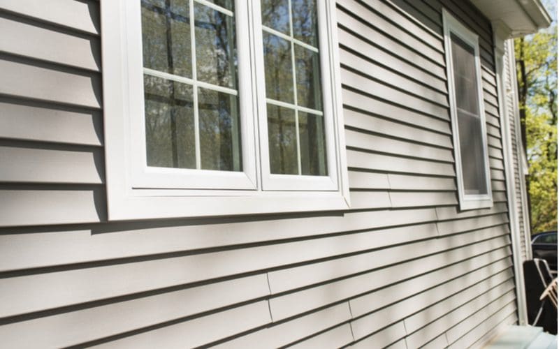 Image of vinyl, a popular type of siding, on a home in a close-up image