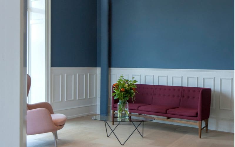 Roundup of wainscoting idea with white painted wood paneling below a blue painted wall