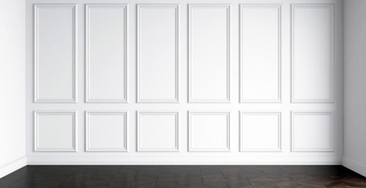 For a featured image on how to paint paneling, a 3d rendering of three walls with a dark wood flooring is pictured