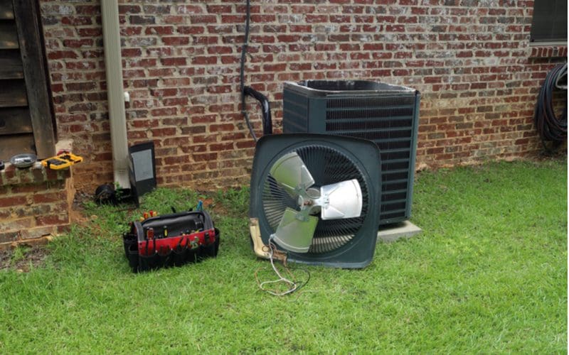 For a piece on HVAC system cost, the fan is being taken off of a new exterior ac condenser