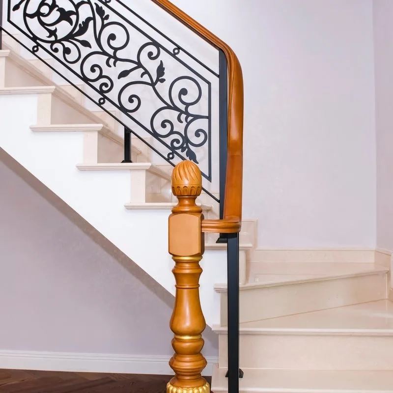Luxury staircase in a gorgeous home with tiled steps and tile bullnose stair trim