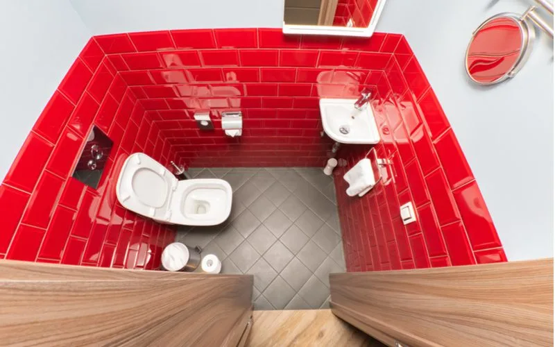 To illustrate the standard toilet room size, a small 30 by 60 inch room has a toilet, sink, and mirror