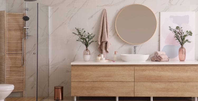 Featured image for a piece on bathroom mirror ideas featuring several products that we can't get enough of