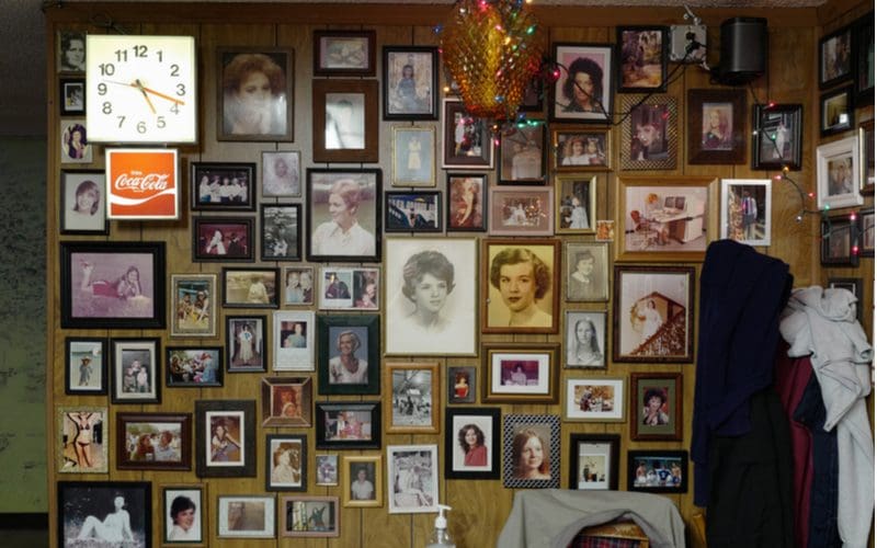 For a piece on basement bar ideas, a bunch of photos of customers hanging on the wall