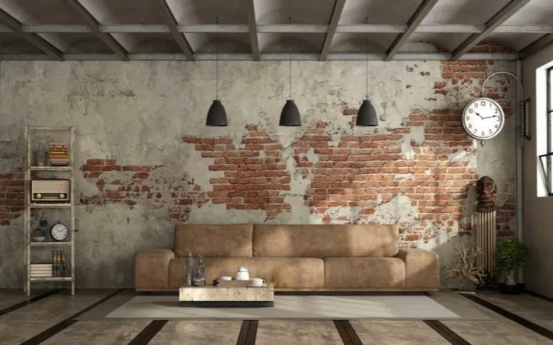 Distressed Industrial Living Room with a dark brown couch in the middle