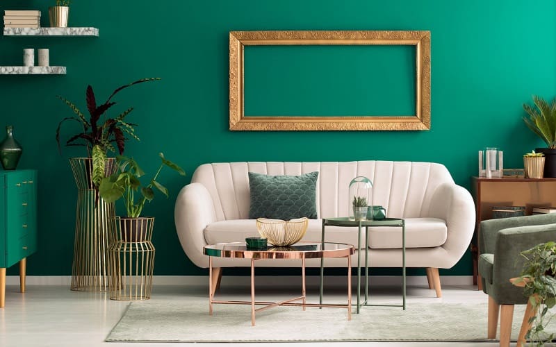 Green living room with beige couch