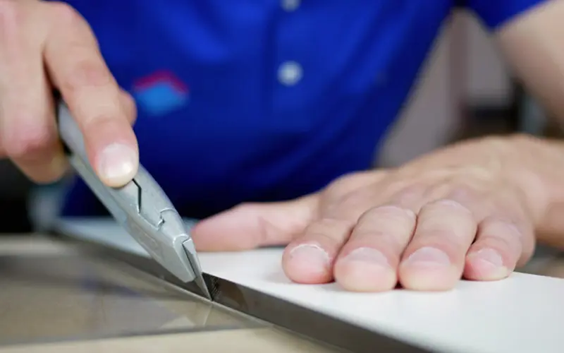 Cutting plexiglass shape with utility knife