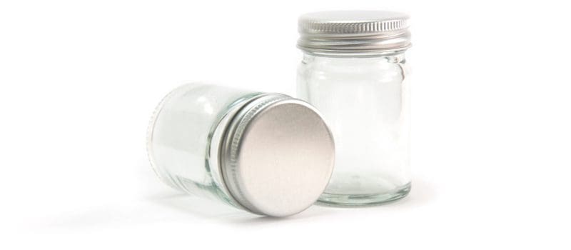 Small bathroom storage idea that Uses Extra-Small Mason Jars to Organize Your Medicine Cabinet