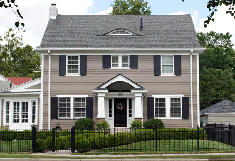 Gray house with black door and black shutters for a front door color for gray house idea