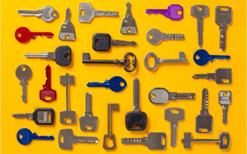 For a piece on the different types of keys, a bunch of keys sit on a yellow background in a layflat image