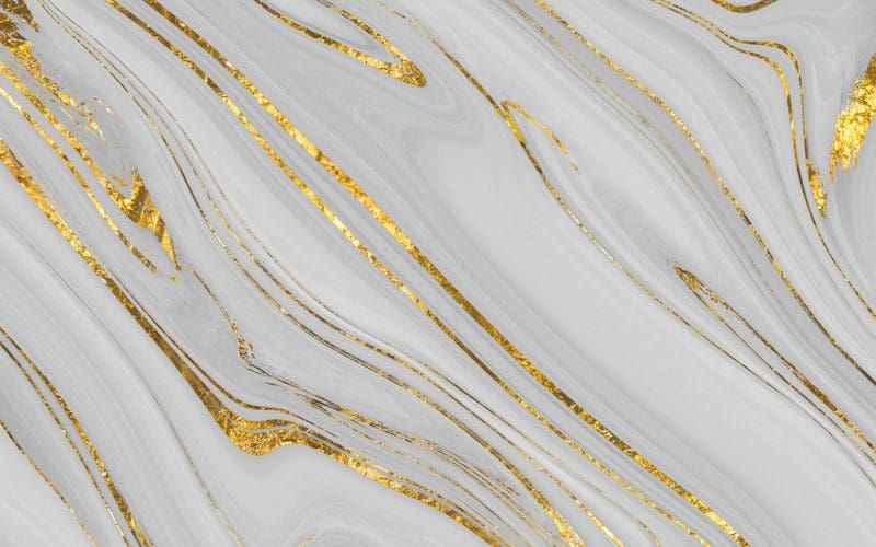 White and gold bathroom vanity top idea with swirly granite