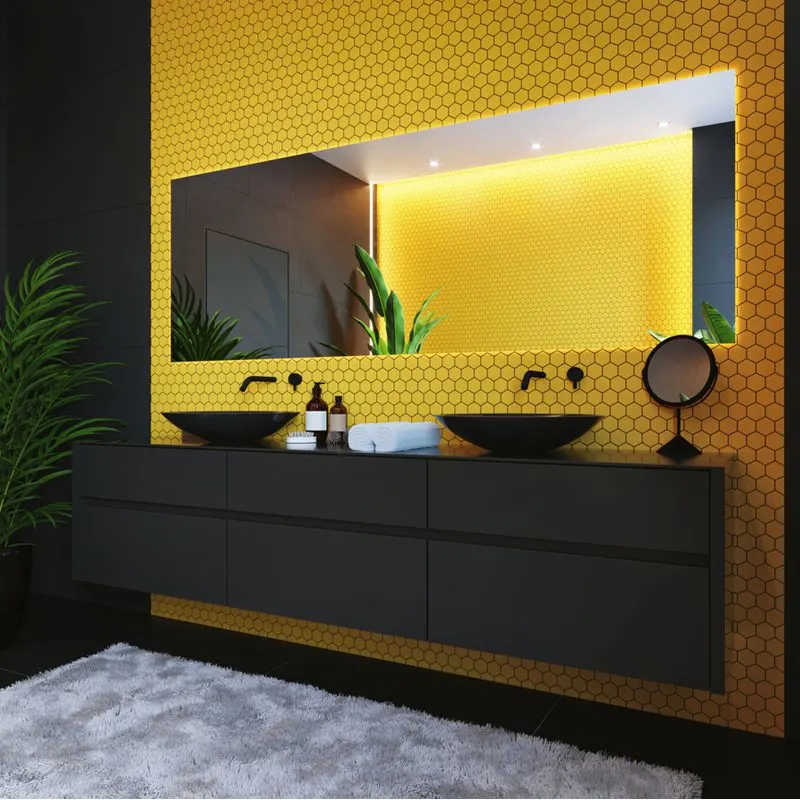 White and gold bathroom idea with yellow hex tile on the back wall behind the floating rectangular boxy sink