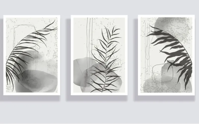Photo of three separate framed images for a piece on mens bedroom ideas under the section minimalist wall art