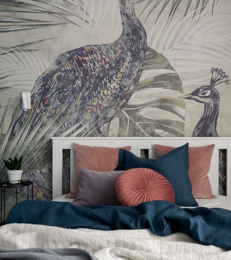 A fancy rose and teal peacock bedroom wall mural with blue bedding