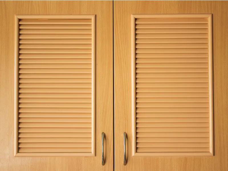Example of cool closet door ideas showing an up-close image of a style titled Wooden Doors With Thin Louvers