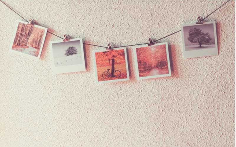 Dorm room idea to make a photo wall with string and polaroid photos