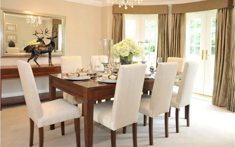 Dining room chairs made of white linen for a piece on best fabric for dining room chairs