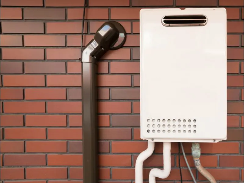 For a piece on can you put a water heater outside, a tankless water heater outside and attached to a brick wall