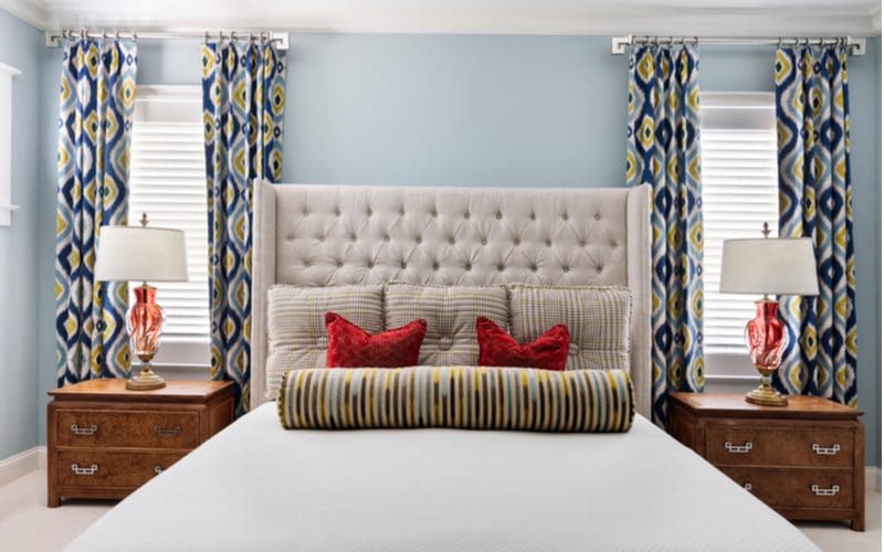 Unique colored curtains in a peacock type pattern for a piece on master bedroom decor ideas
