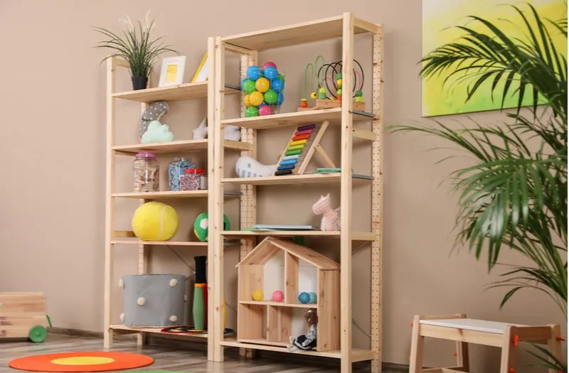 Modern Open Shelving in natural wood color for a piece on living room toy storage ideas