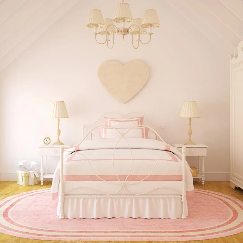 Cute room for girl idea with a pastel pink wardrobe, bedding, rug, walls, and wardrobe