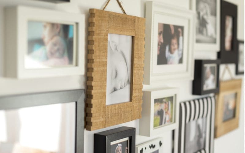 Family photos in frames in a kitchen used as wall décor