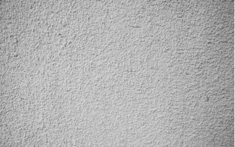 Concrete-Textured Wall for a piece on modern drywall texture types