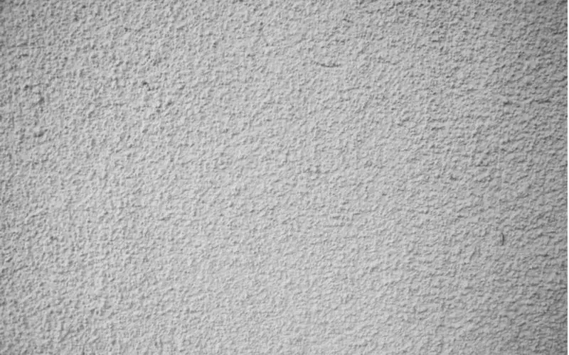 Concrete-Textured Wall for a piece on modern drywall texture types