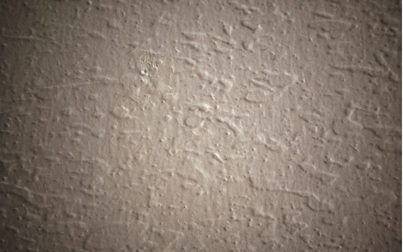 Orange Peel Texture on White Wall